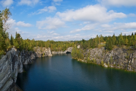 View of the forest lake in the rocks of marbleの写真素材