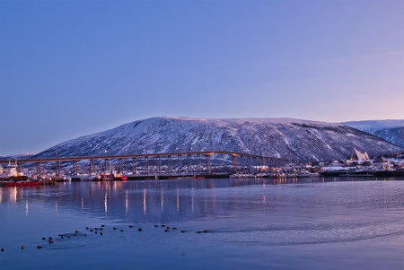 Arctic city of Tromso with bridge and famous cathedral. Norwayの写真素材