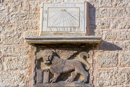 Venetian winged lion over the entrance to the Soardo Bembo castlの写真素材