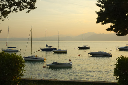 Boats on the lake at sunsetのeditorial素材