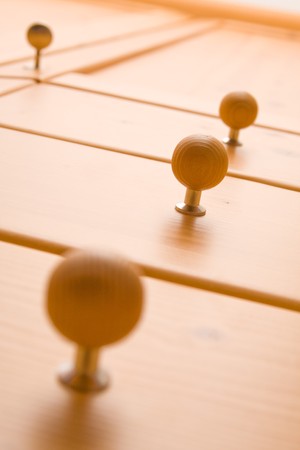 Modern wooden drawer handles. Shallow depth of field.の写真素材