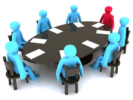 Blue and red characters around the table on meeting.の写真素材