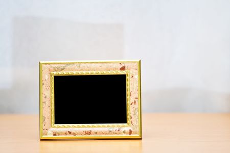 Picture frame with golden border and blank space for your image.の写真素材