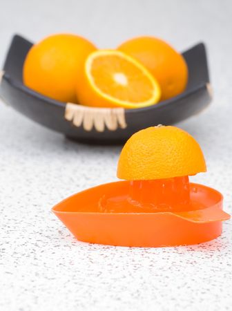 Making tasty orange juice on kitchen desk.の写真素材