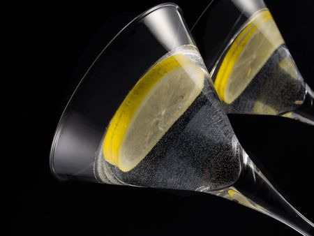 martini with lemon over blackの写真素材