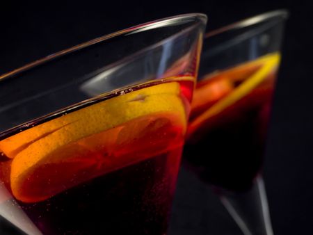 cocktail with lemon over blackの写真素材