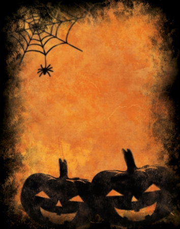 Grunge textured background with halloween pumpkinsの写真素材