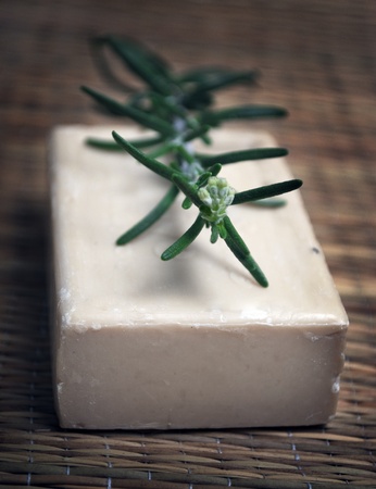 Bar of natural soap with fresh rosemary の写真素材