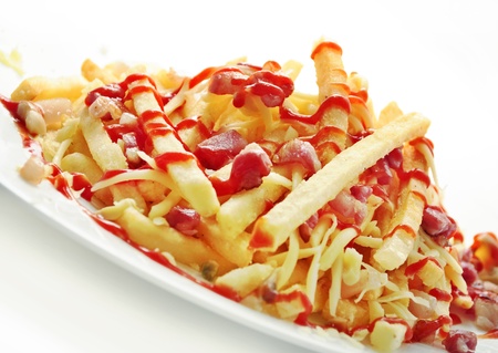 Delicious french fries with bacon and cheese