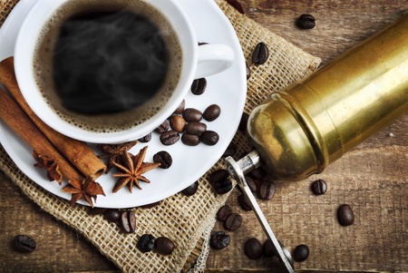 Cup of coffee and coffee millの写真素材