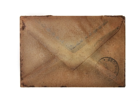 Vintage envelope isolated over whiteの写真素材