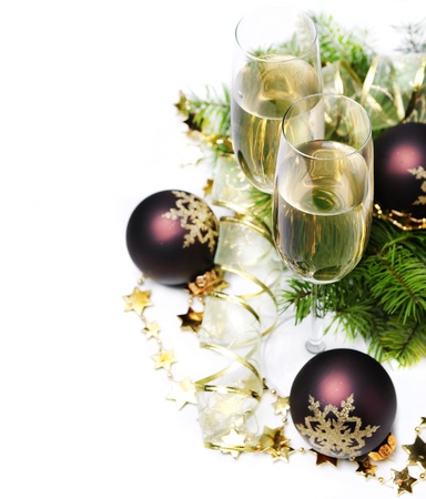 Two champagne glasses and christmas ornamentsの写真素材