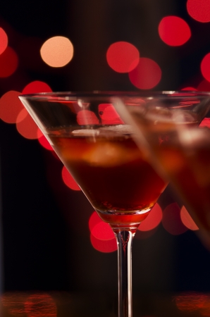 Red cocktail in martini glassesの写真素材