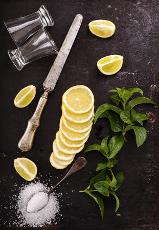 Cocktail shot ingredients on black rustic board.の写真素材