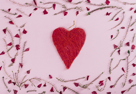 Valentine's day background design. Top view of valentine heart and flowers pattern over pink background.の写真素材