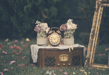 Vintage still life decoration for wedding reception. Marriage and love concept in retro style. Bridal arrangement.の写真素材