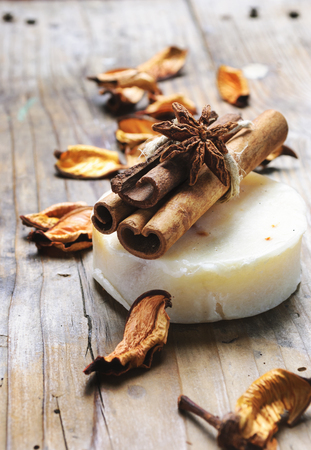Natural handmade soap bar with anise and cinnamon scent essential oil for beauty bath and body care. Aromatherapy and bathroom still life.の写真素材