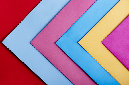Trendy pastel colors in geometry shape flat lay. Colorful rainbow paper creative linear background. Abstract minimal vivid art design.の写真素材