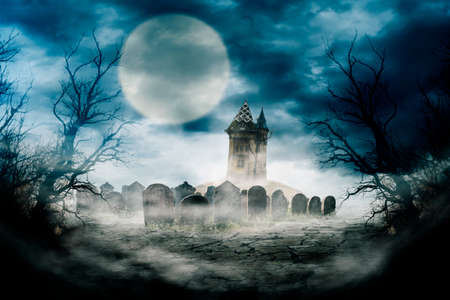 Spooky night scene background composition. Halloween composition design with scary dark forest, haunted house and graveyard. Mystery horror landscape with halloween pumpkins.の写真素材