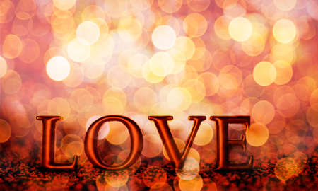 Golden foil love balloons on glitter gold bokeh confetti. Valentine's day greeting card. Luxury valentine background with abstract shiny blur and love letter. Romantic and magic special occasion celebration.の写真素材