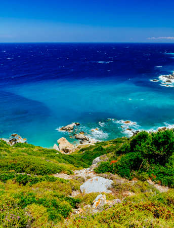 Mediterranean hidden places at Kastro, Skiathos island, Greece. Beautiful vivid panorama view of blue aegean sea coast from wild cliff.  Summer holiday vacation tour.の写真素材