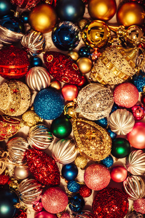Various traditional christmas ornaments decor from above. Vintage colorful glass xmas baubles...