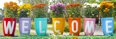 Welcome sign, at the flower pot.の写真素材