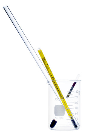 thermometer on glassware isolated on white background