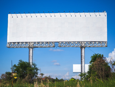blank billboard on blue sky, for fill textの写真素材