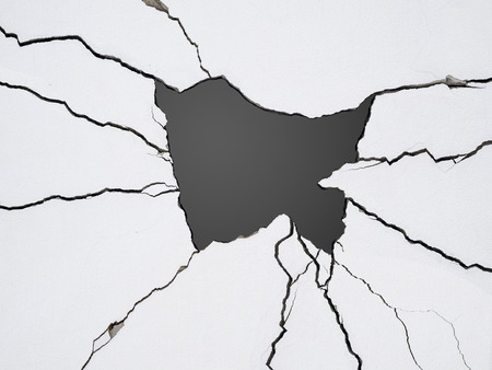 cracks on concrete wall creating ramdom linesの写真素材