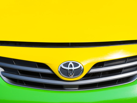 BANGKOK, THAILAND - MARCH 07, 2015: TOYOTA logo on the front of a car. TOYOTA is Japanese's car manufacturer which sold around the world.のeditorial素材