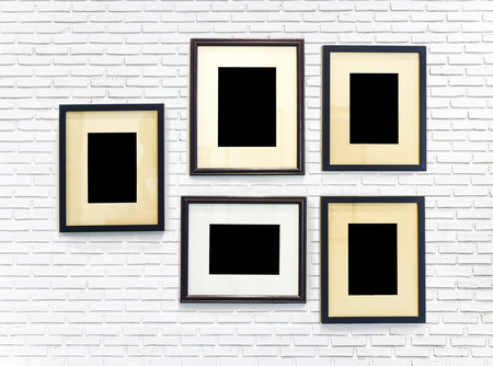 photo frame on white brick wall texture backgroundの写真素材