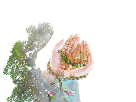 double exposure of muslim woman praying for Allah, muslim Godの写真素材