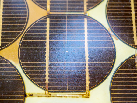 close up of aged solar cell in sunlight photovoltaic generation, electrical energyの写真素材