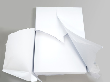 stack of paper, white plain office paper on gray backgroundの写真素材