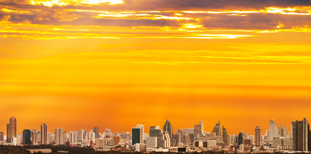 cityscape and skyline on the colorful sunrise cloud, soft light addedの写真素材