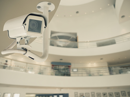 Security CCTV camera or surveillance system in modern office buildingの写真素材