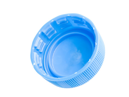 blue plastic bottle cap isolated on white backgroundの写真素材