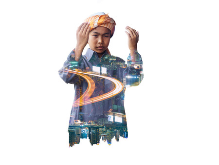 double exposure of muslim child praying for Allah, muslim Godの写真素材