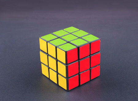 BANGKOK, THAILAND - June 18, 2016: Rubik's Cube on dark background. This famous cube puzzle was invented by the architect Erno Rubik in 1974.のeditorial素材