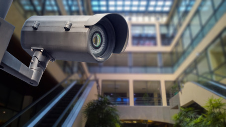 Security CCTV camera in office building installed indoorの写真素材