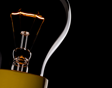 close up shot on light bulb on the dark for creativity conceptの写真素材