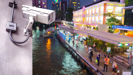 Security CCTV camera or surveillance system installed on concrete pole watching for protection