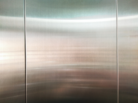 real metal stainless steel in texture background, abstract surface in industrial equipment.の写真素材
