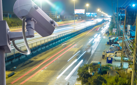 Security CCTV camera or surveillance system installed on metal pole watching for protection