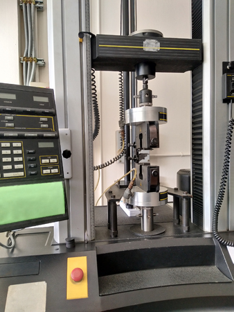 tensile strength test, engineering material property of metal and rubber are testing in physics...