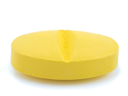 Super macro shot of Medicine: pills  or capsules on white background. Drug prescription for treatment medication. Pharmaceutical medicament, for health or antibiotic conceptの写真素材