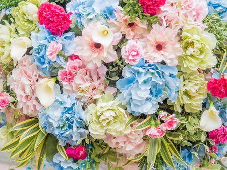 beautiful artificial flowers on artistic background, flower patternの写真素材