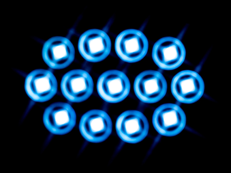 flare of bright light source on dark background, defocusedの写真素材