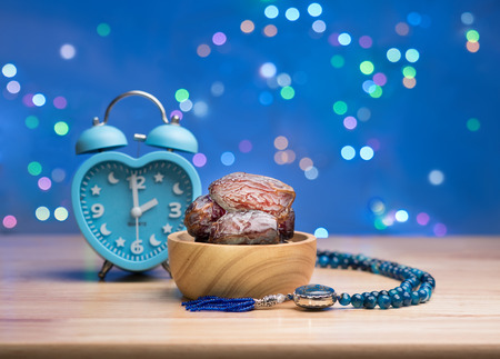close up shot on dates, sweet dried fruits on wooden background,  vegetable for diet with nutrition ingredient concept.の写真素材